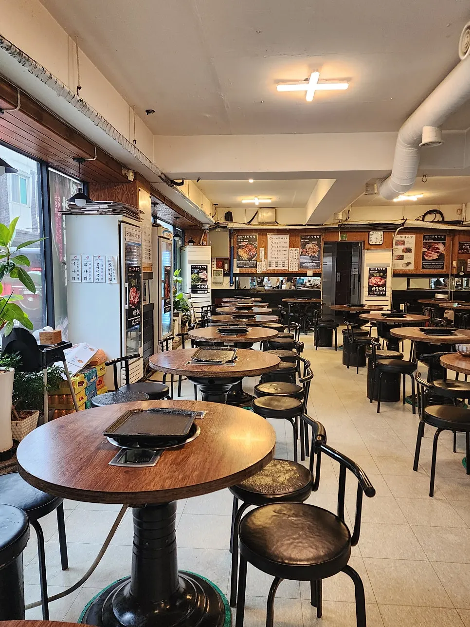 Restaurant interior with comfortably spaced tables