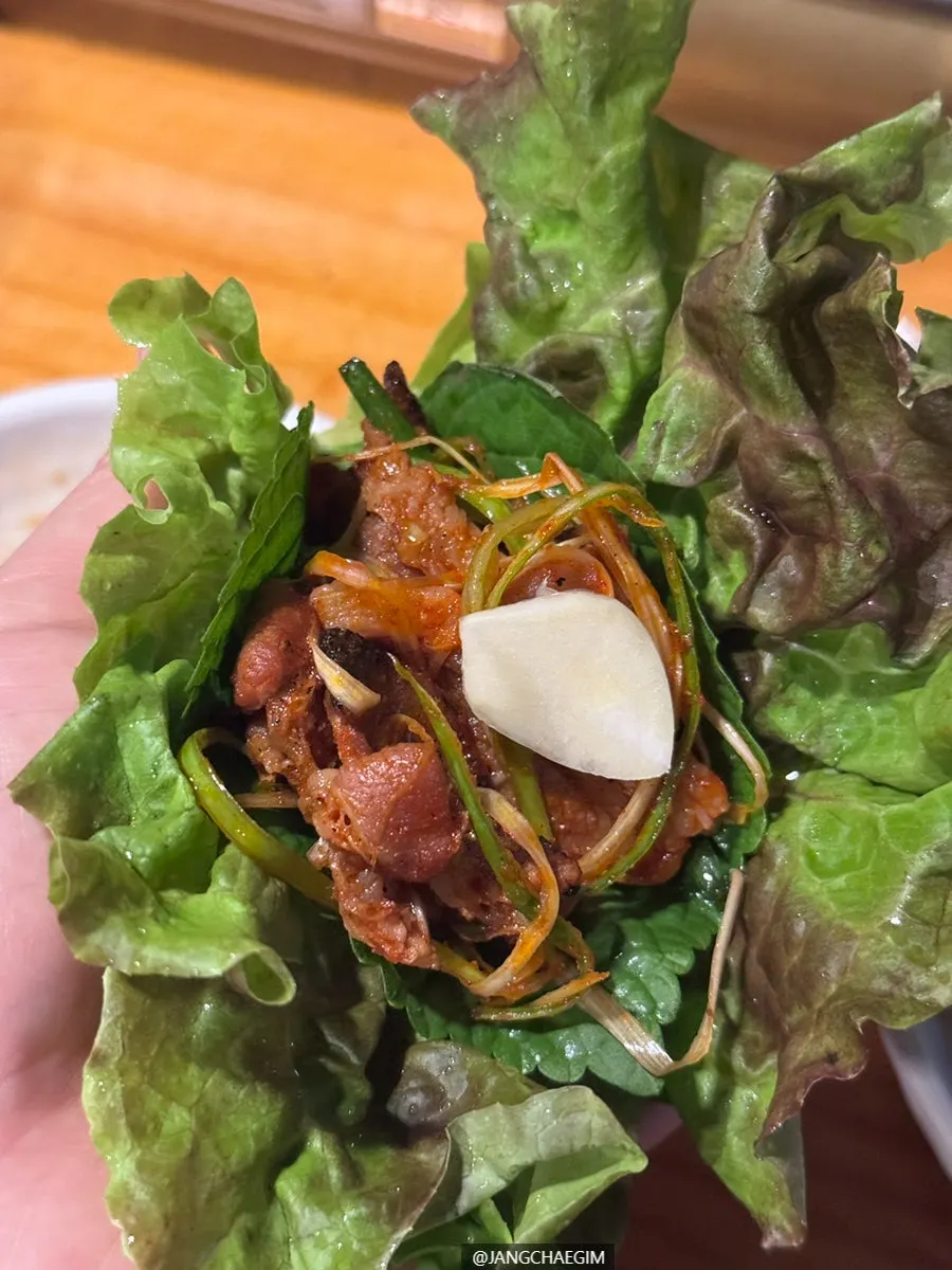 Charcoal gochujang bulgogi wrapped in lettuce
