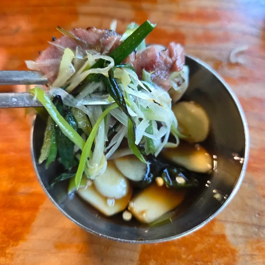 Bulhyangjip's house special sauce with garlic and cheongyang chili added