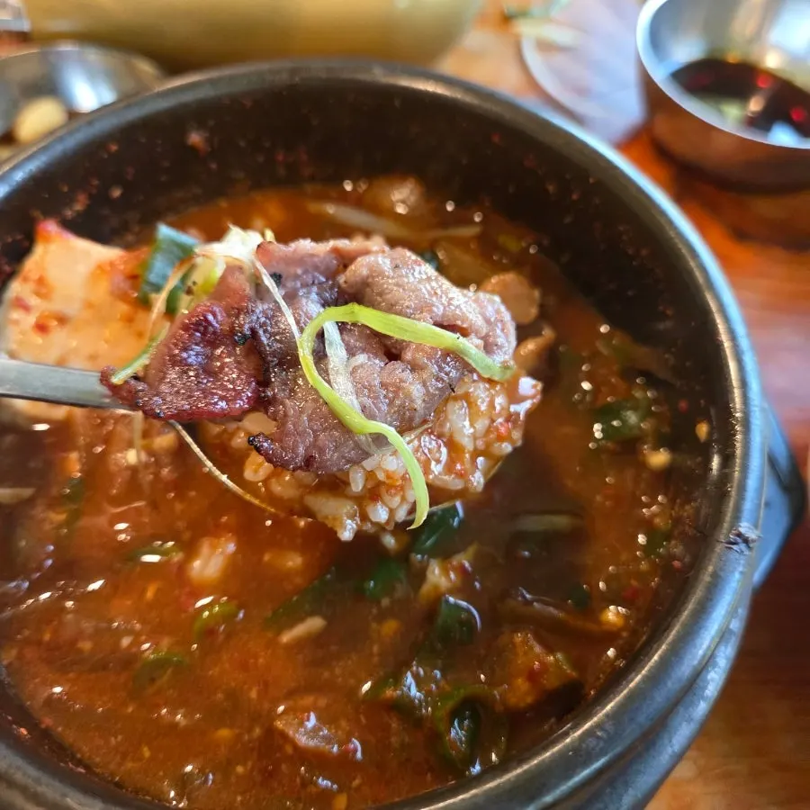 A full spread with doenjang jjigae and bulgogi