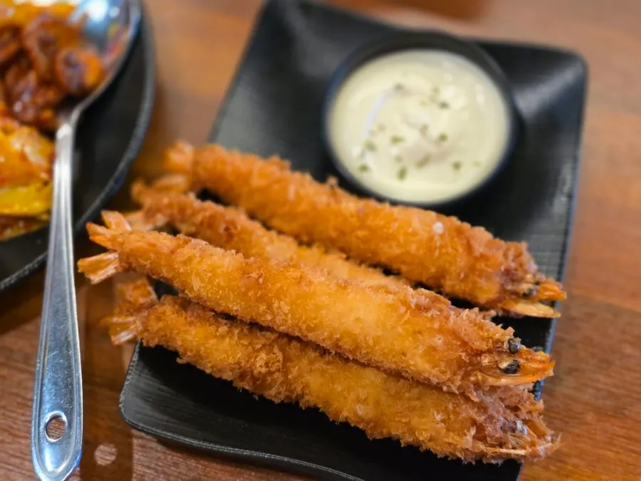 Four large pieces of shrimp tempura