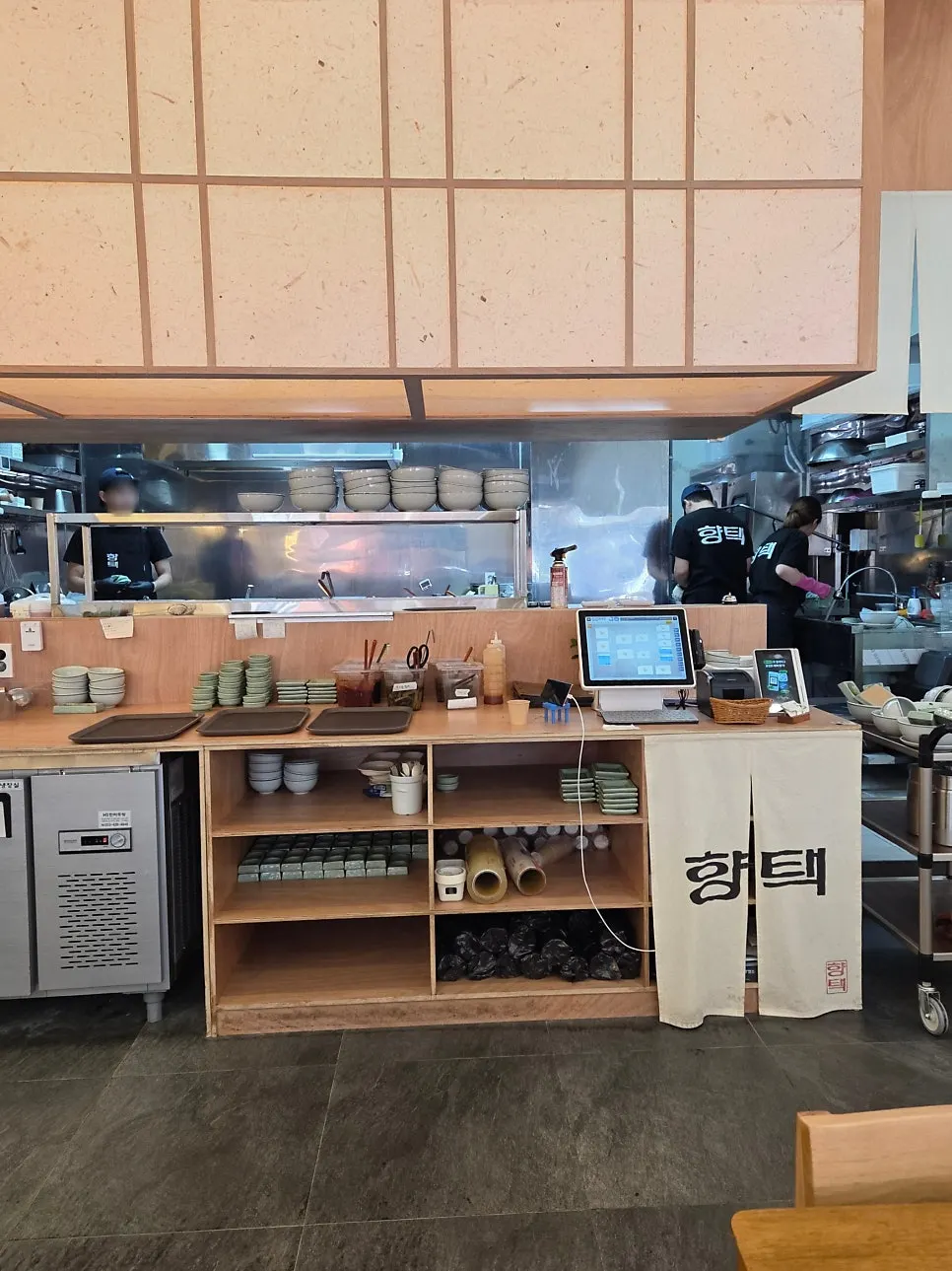Wood-toned interior dining hall at Hyangtaek