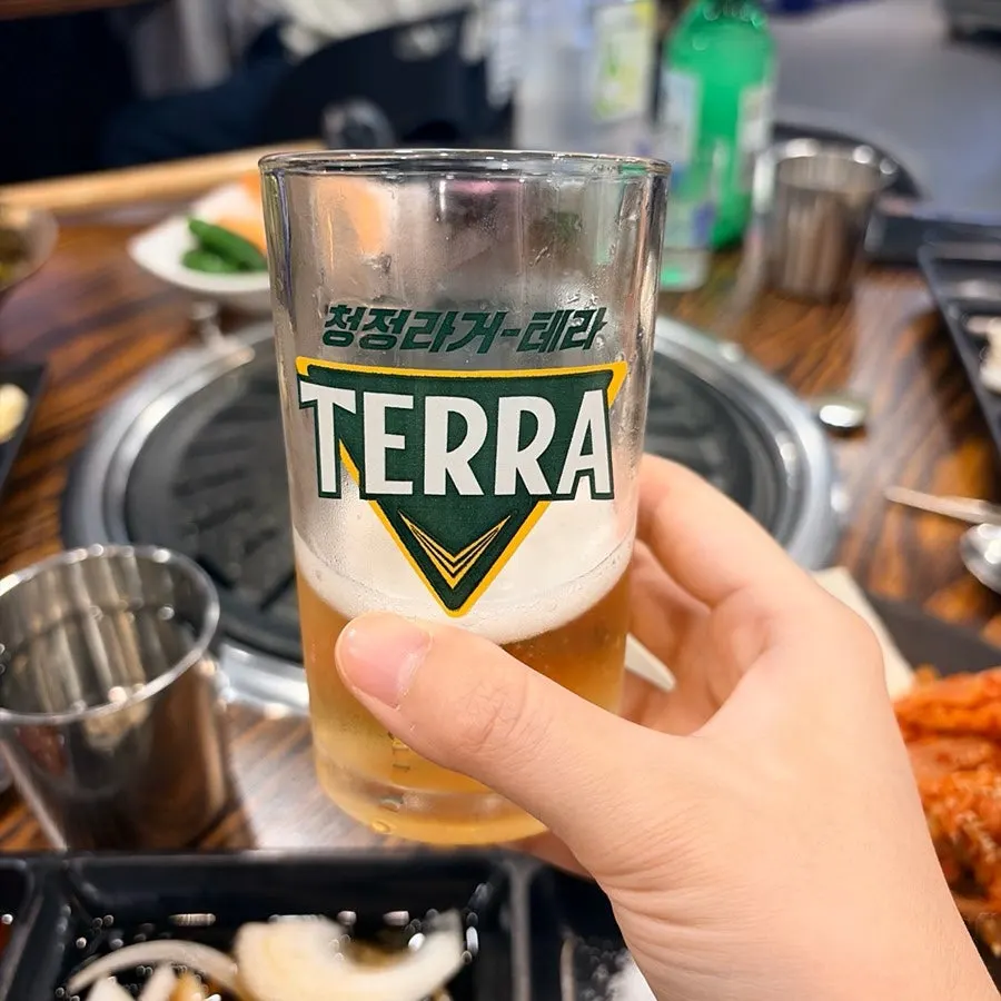 A glass of somaek made with soju slush