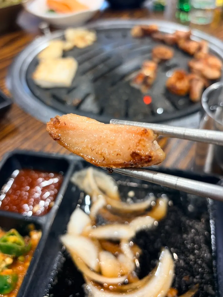 Beef daechang grilling with oil rising
