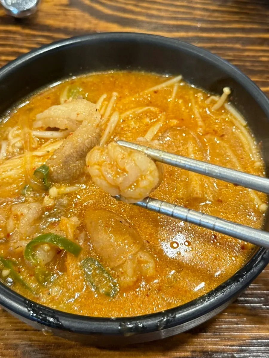 Beef tripe scooped out of the hot pot
