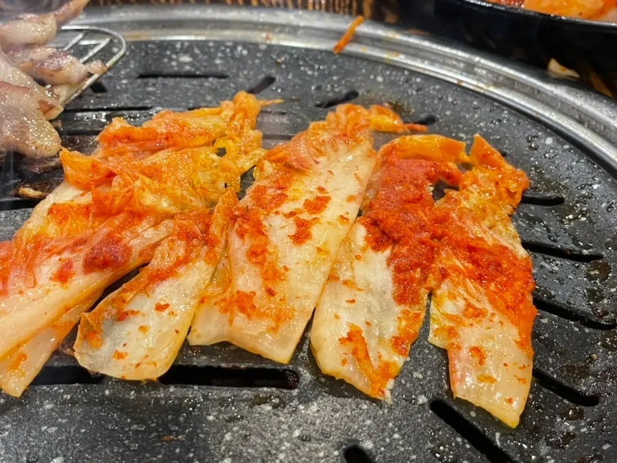 Cabbage kimchi grilling on the grill plate