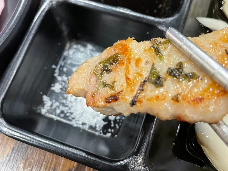 Pork belly dipped in gochujang sauce