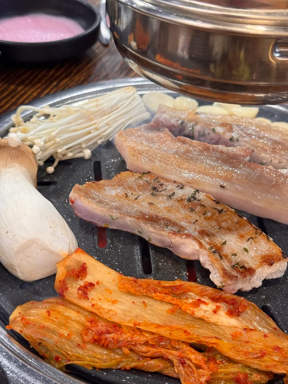 Raw pork belly turning golden brown