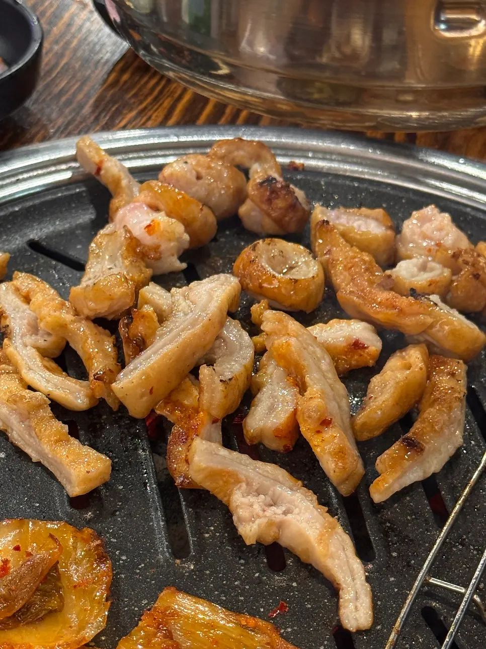 Makchang placed on the heated grill