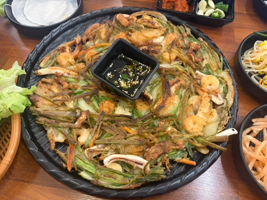 Seafood pancake filling the entire plate