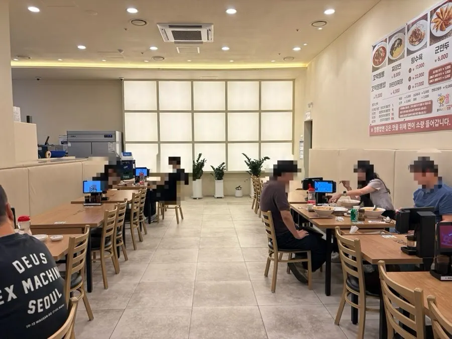 Interior with 4-top and 2-top tables