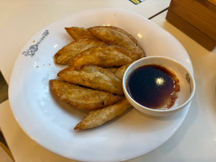 Plate of crispy-outside, juicy-inside fried dumplings