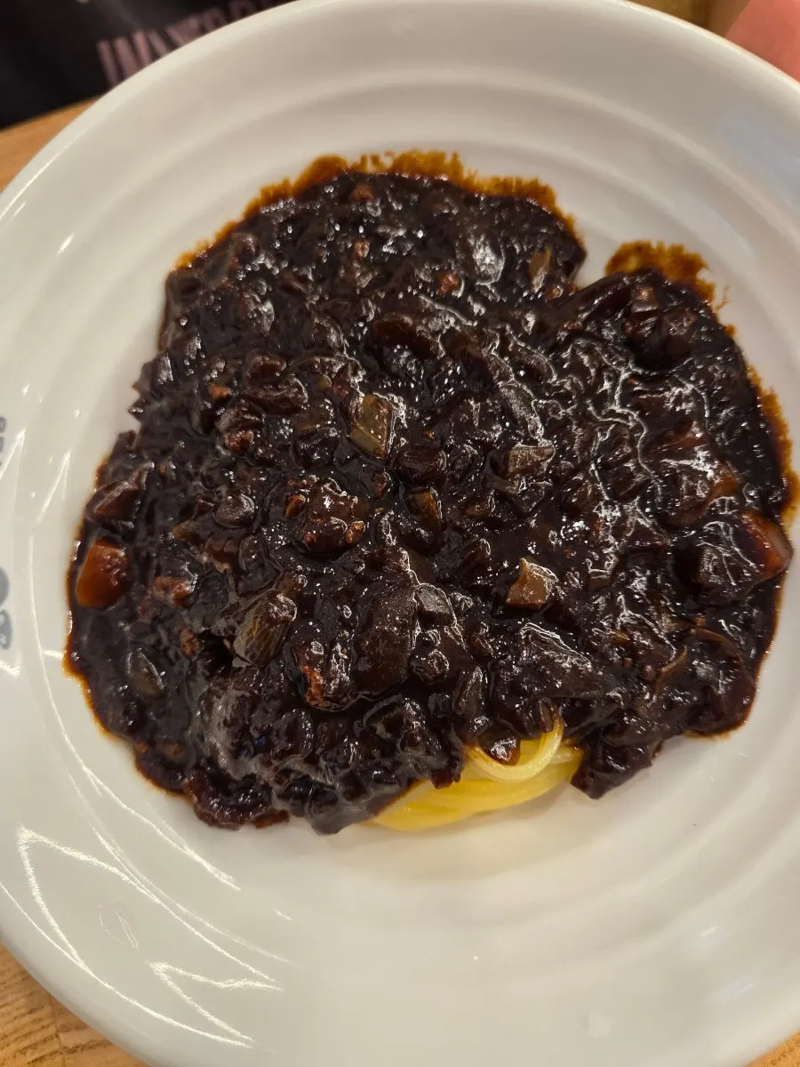 Jjajangmyeon with sauce thickly coating the noodles