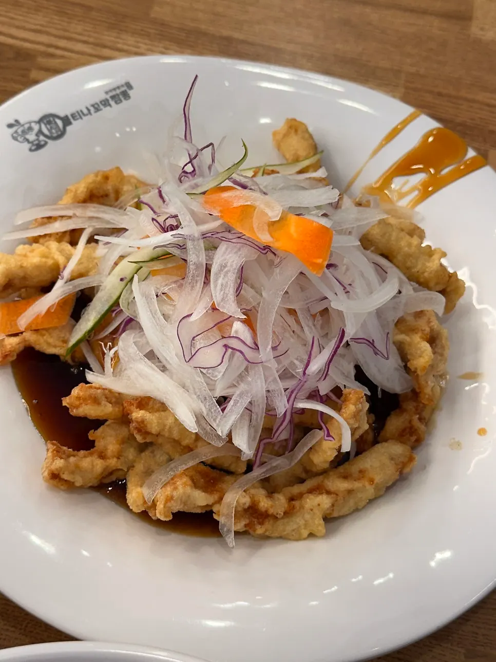 Medium sweet-and-sour pork topped with onions