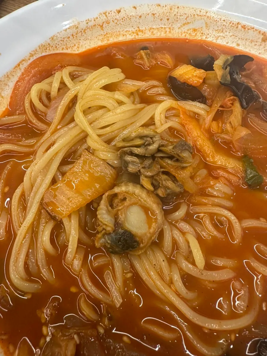 Cockle jjamppong broth with mushrooms