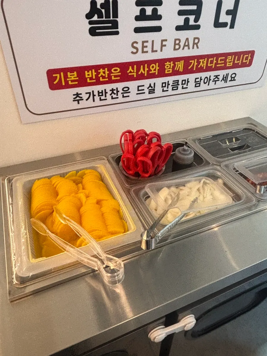 Sign showing how to best enjoy cockle jjamppong