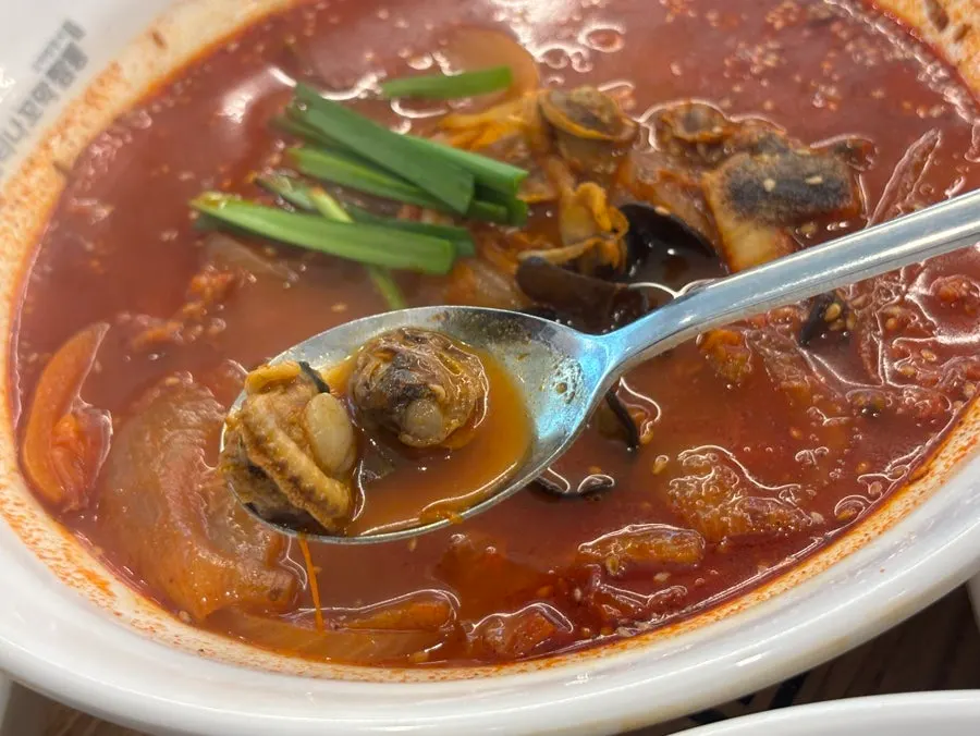 Cockles sitting in the broth