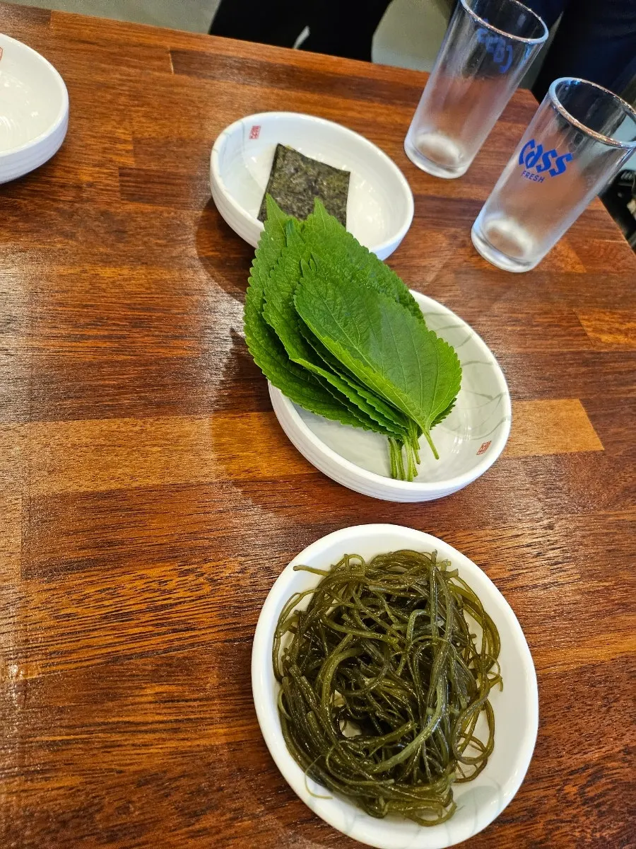 Ten kinds of basic side dishes including flying fish roe, soybean powder, and gijeli seaweed