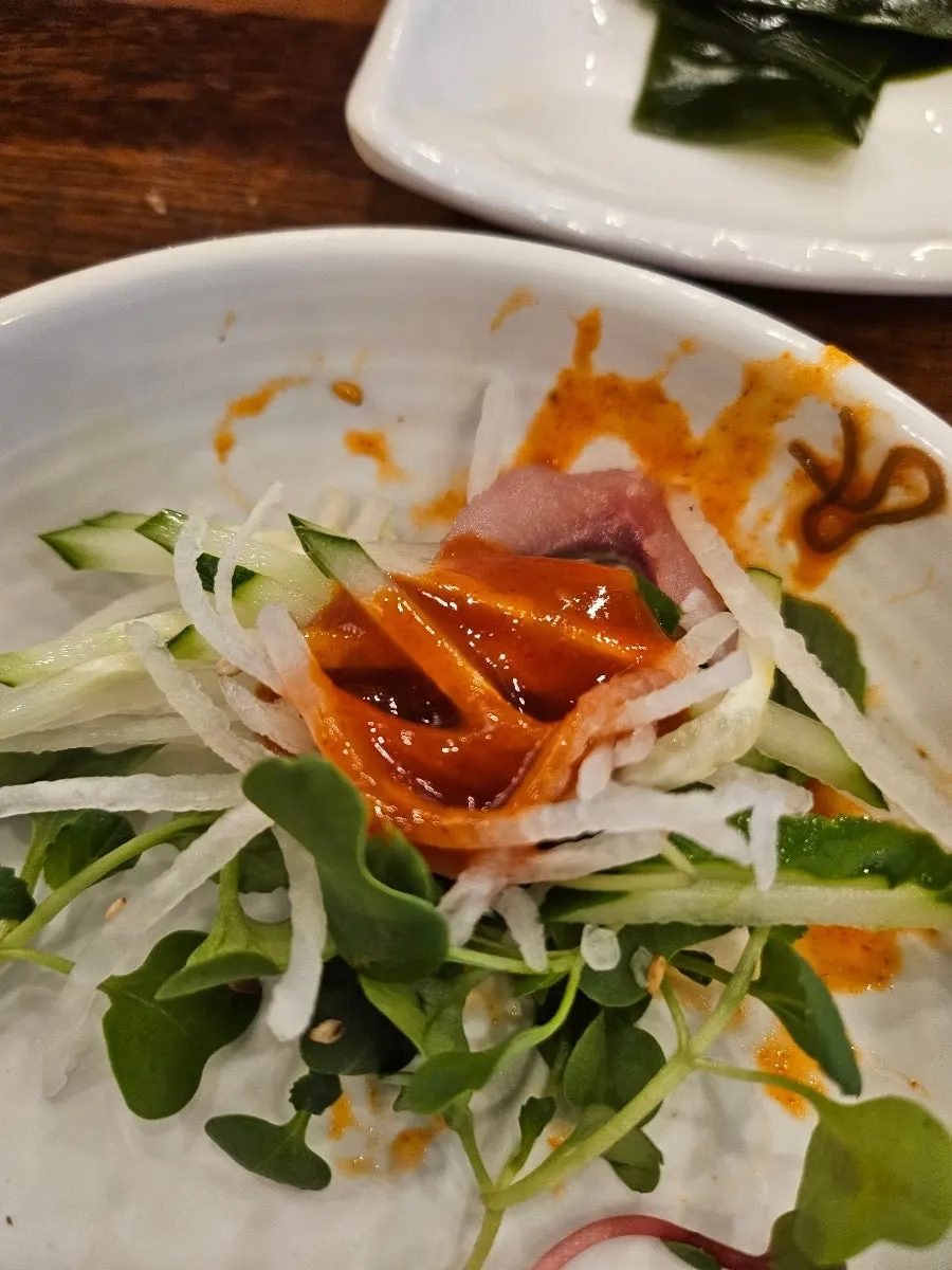 Close-up of a makhoe wrap packed with vegetables