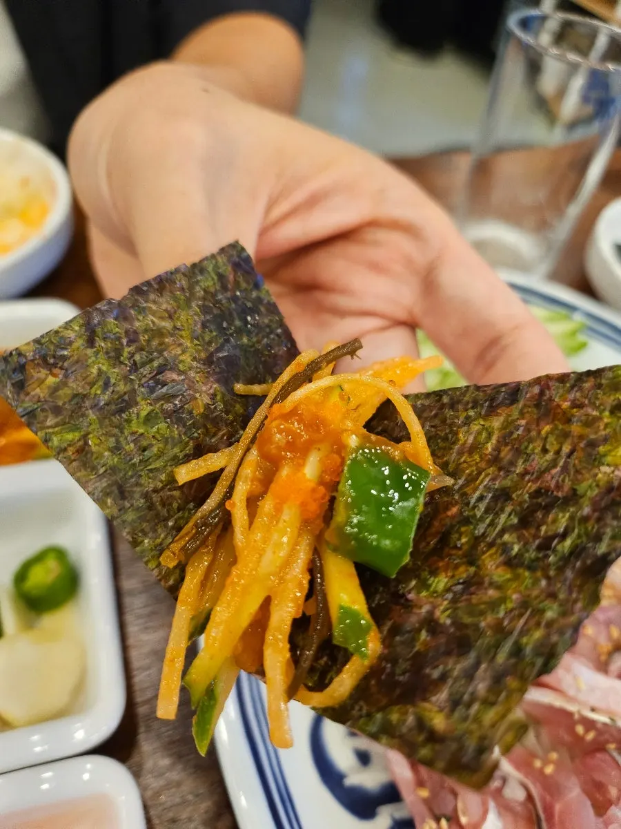 A simply wrapped makhoe roll in gim
