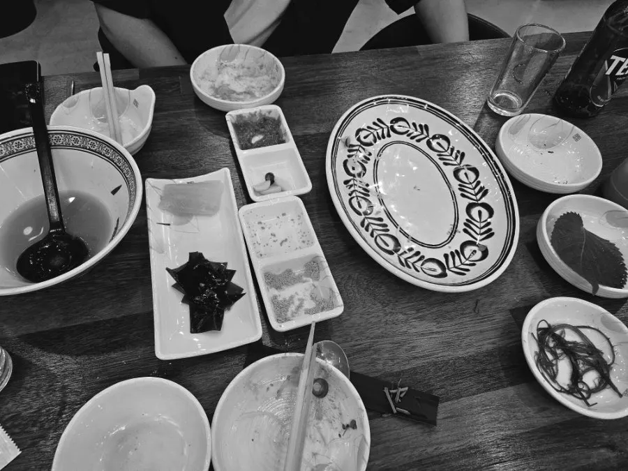 An empty plate cleaned down to the last vegetable