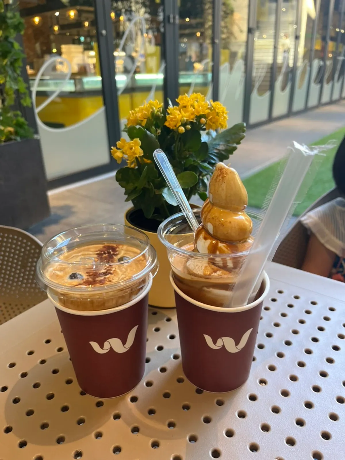 Wunder Coffee Bar drink placed in a paper cup for extra care