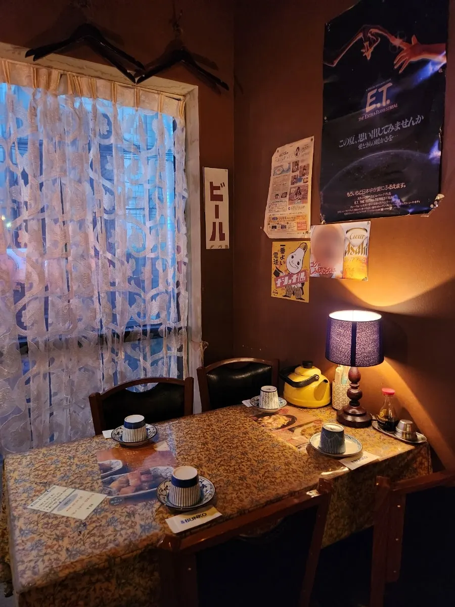 2nd-floor entrance and calm interior of Bunko Suyu