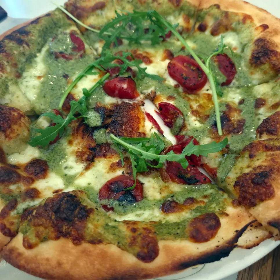 Golden-baked basil margherita pizza