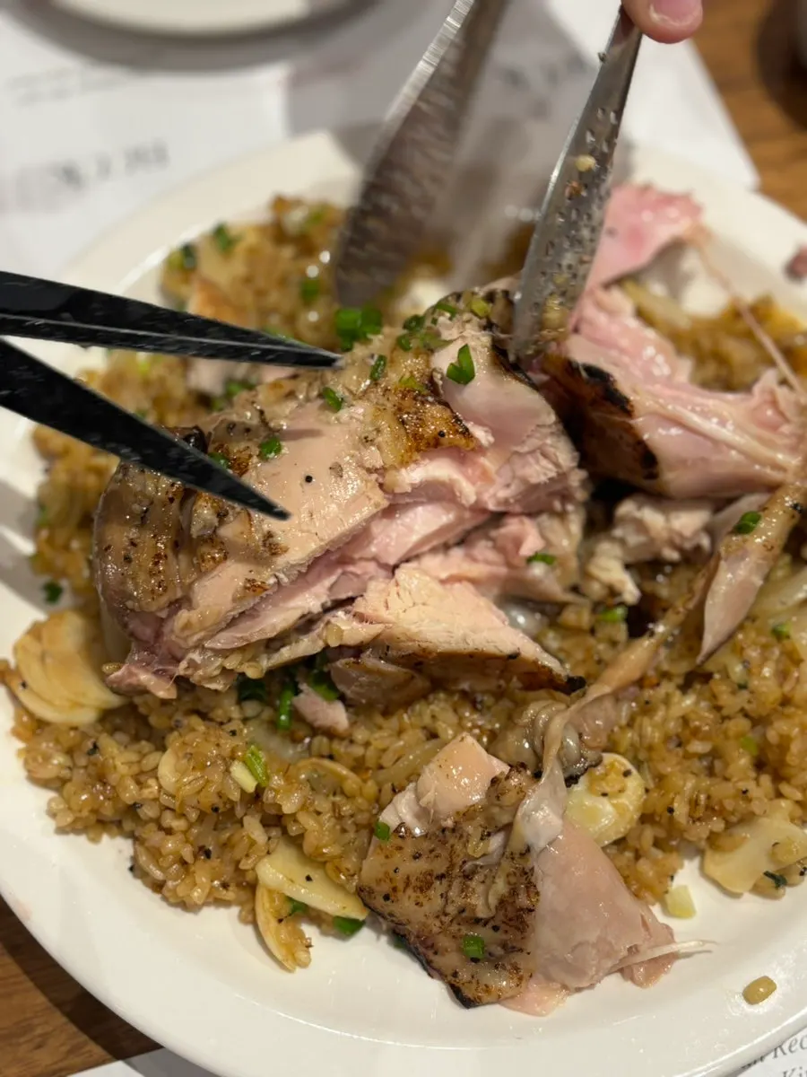 Kung pao chicken on top of the pilaf