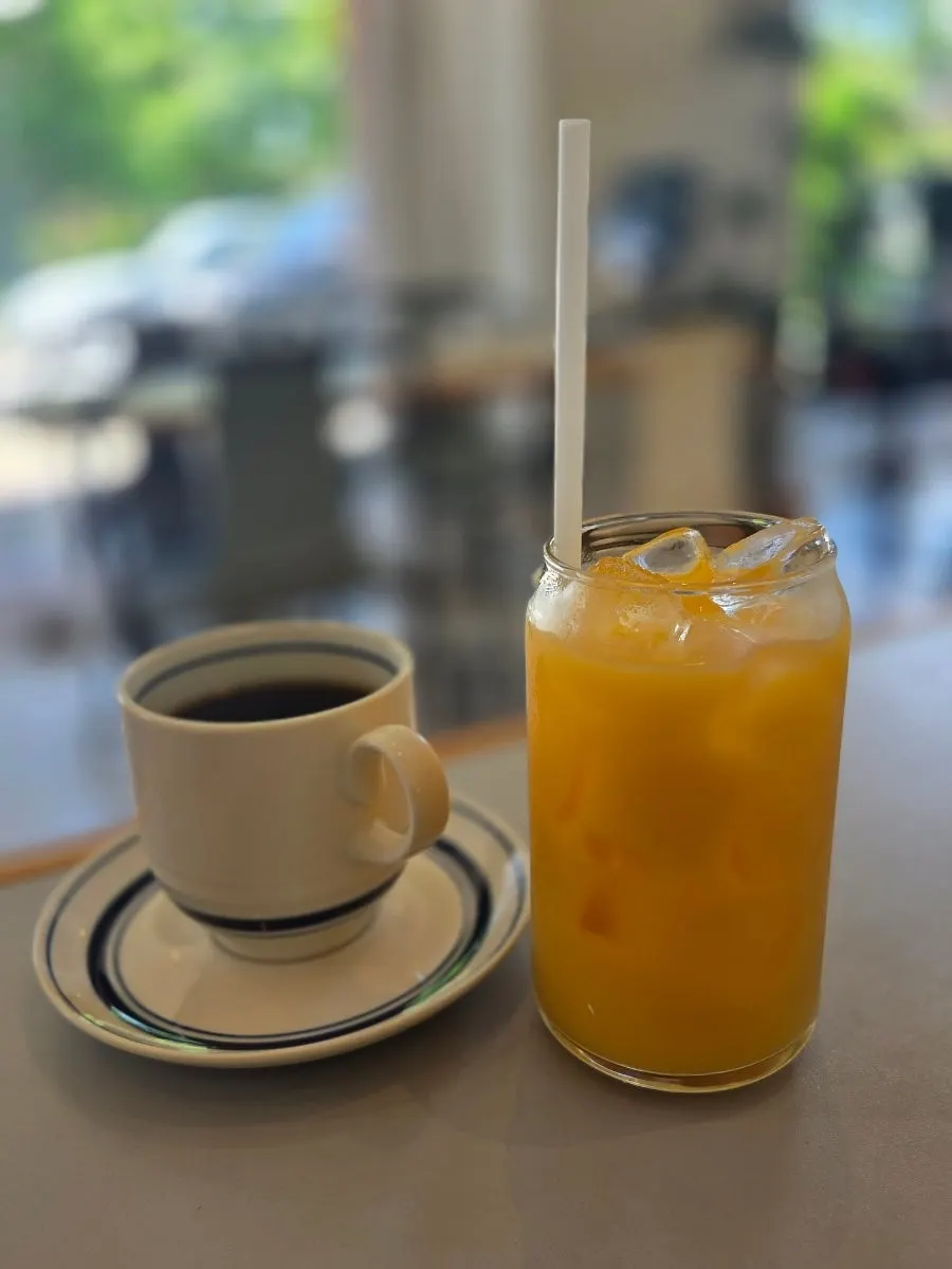 Coffee and orange juice served with the couple set