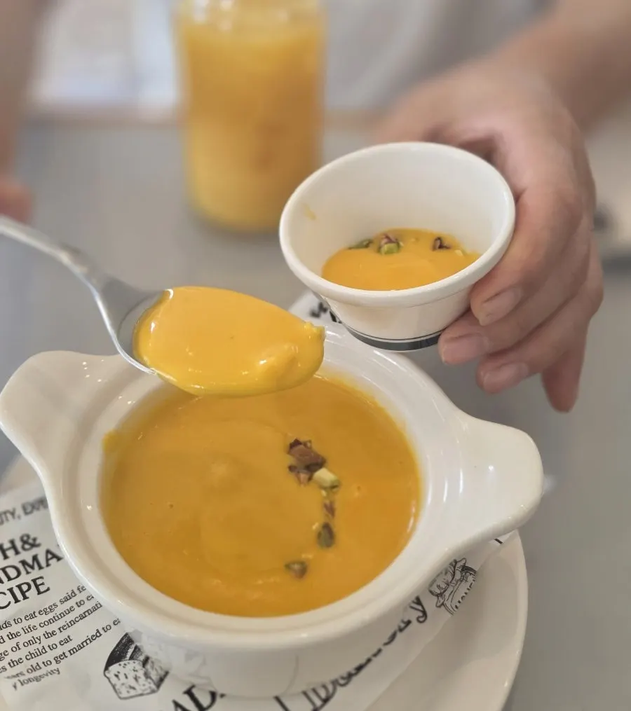 Pumpkin soup topped with nuts
