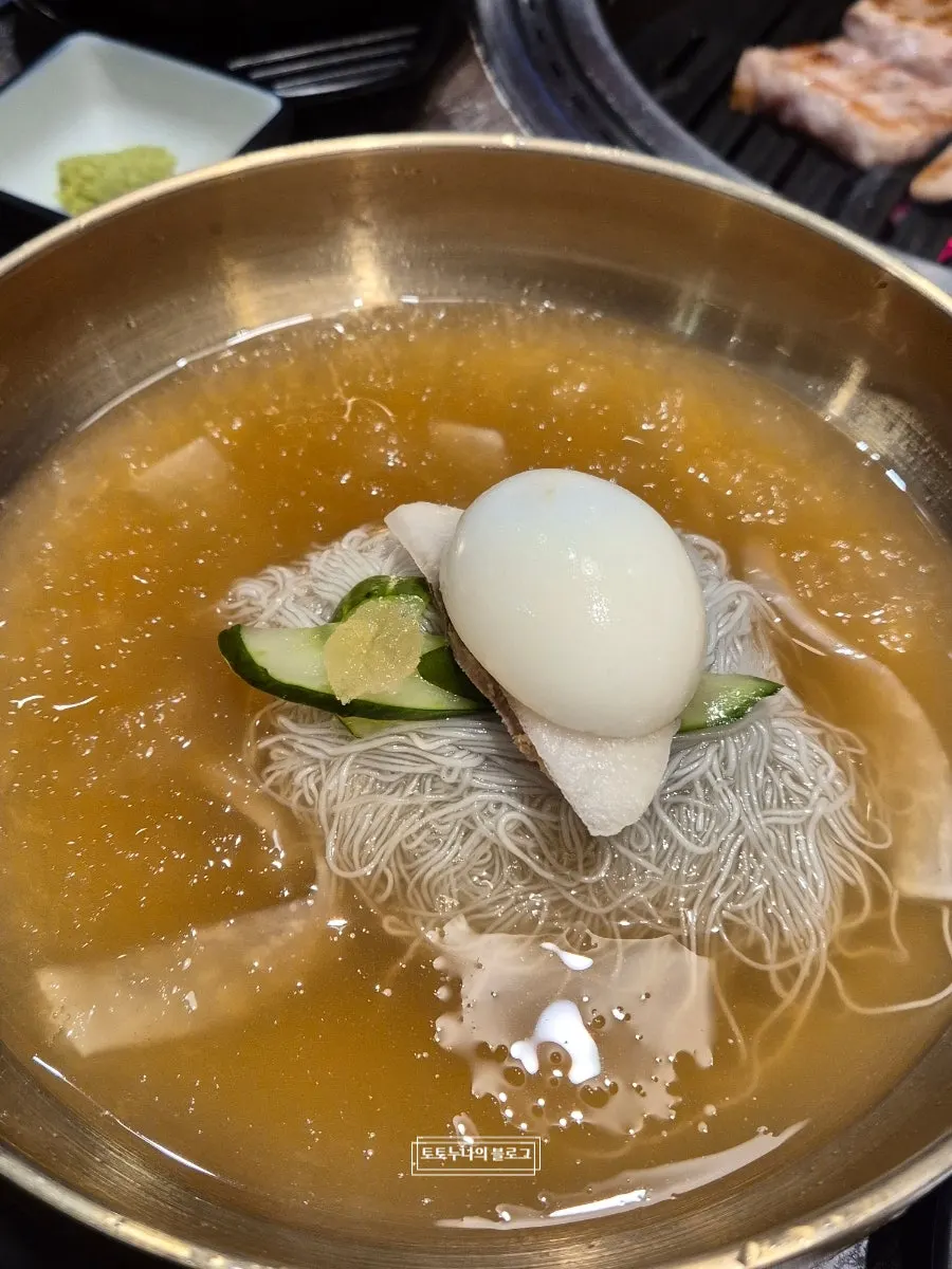 A bowl of thin-noodle mul naengmyeon