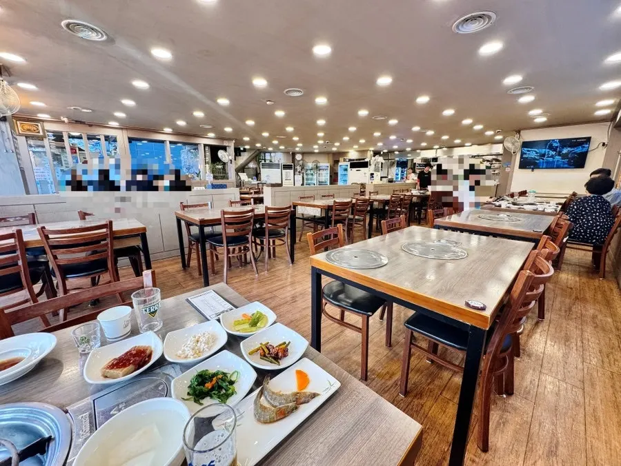 Spacious hall with tables divided into several sections