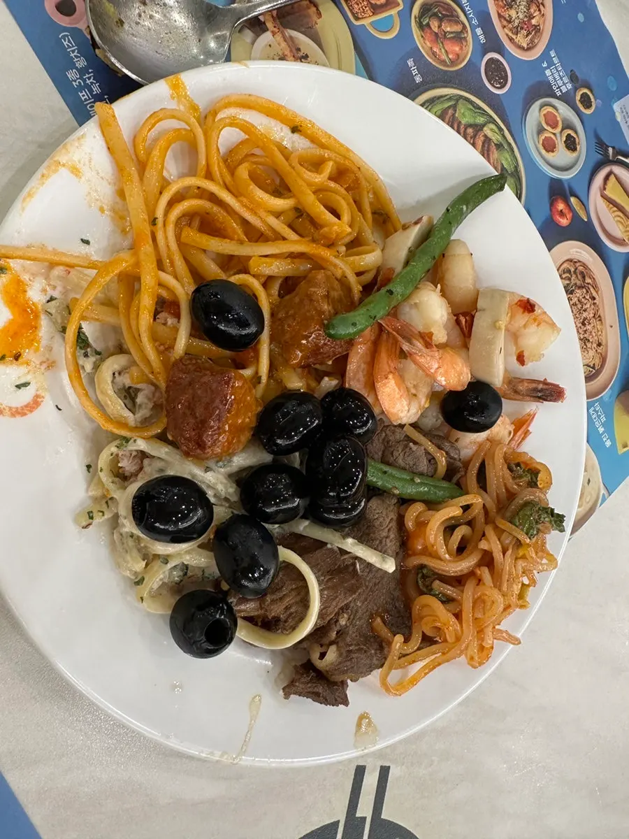 Plate of sushi and gamjatang fried rice