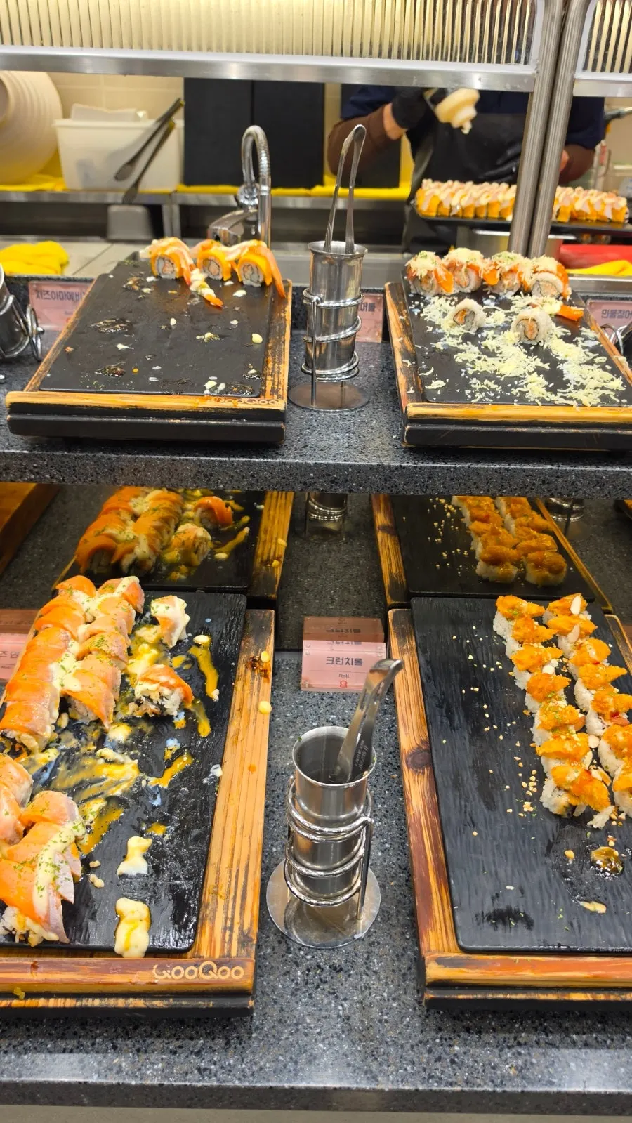 Sushi display case with a variety of nigiri
