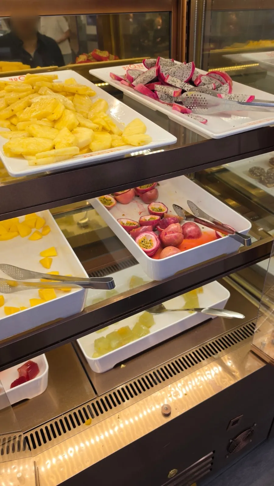 Unusual fruits like red dragon fruit and rambutan