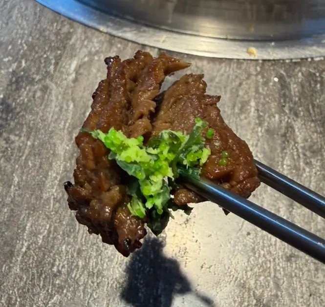 A perfectly cooked piece of Idong galbi