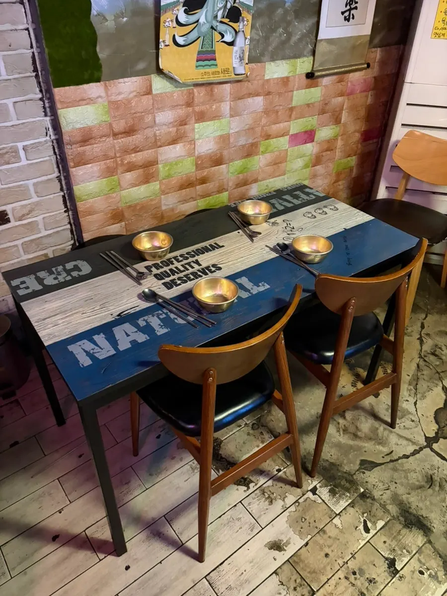 Indoor tent-bar-style tables at Bupyeong Pocha