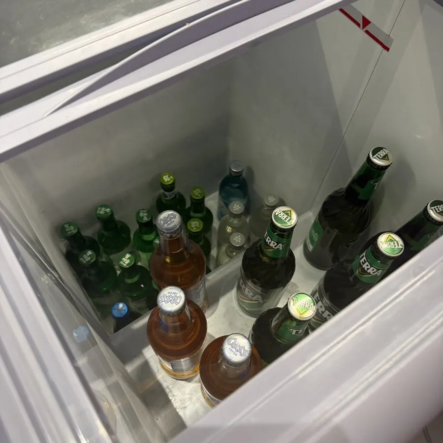 Self-serve soju fridge placed near the tables