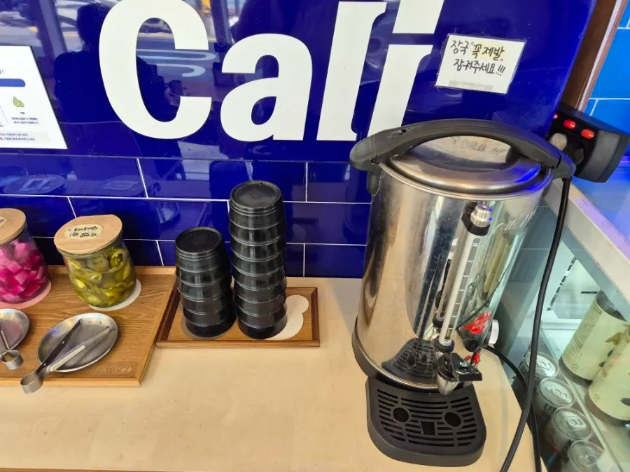 Self-service bar with sauces and side dishes