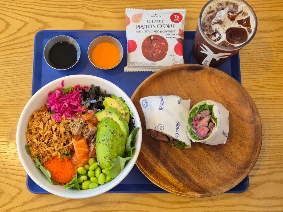 Tray with salmon poke and a whole-wheat wrap