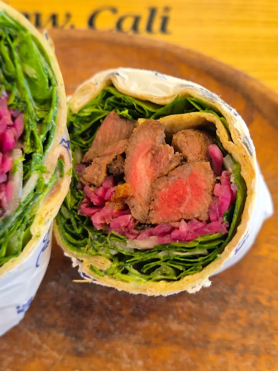 Cross-section of a chewy flat-iron steak wrap