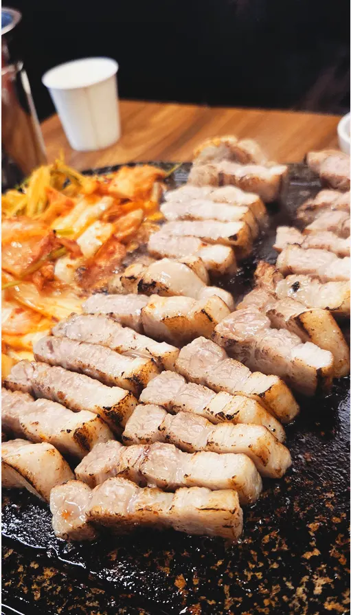 Torch-seared pork belly cut into bite-sized pieces