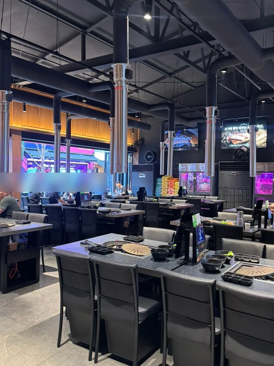 Location information for a Korean BBQ restaurant in Sinjung-dong