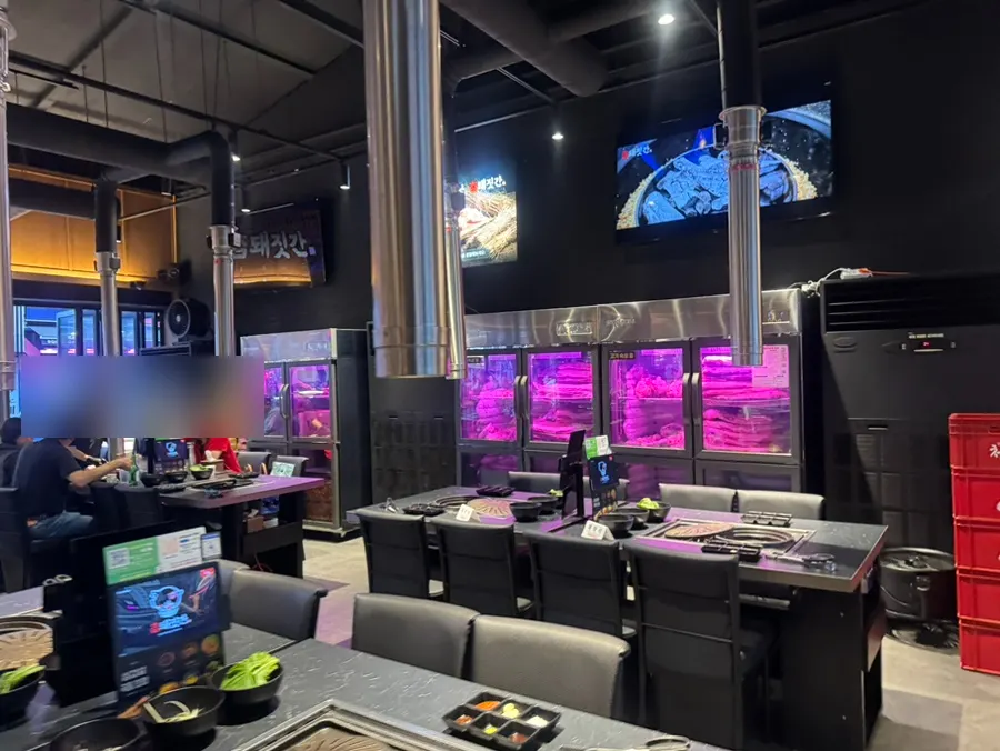 Spacious Korean BBQ restaurant dining area
