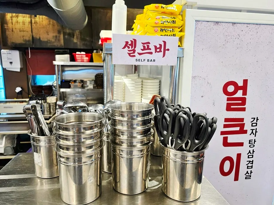 Signage for stone-pot bone stew and side dishes