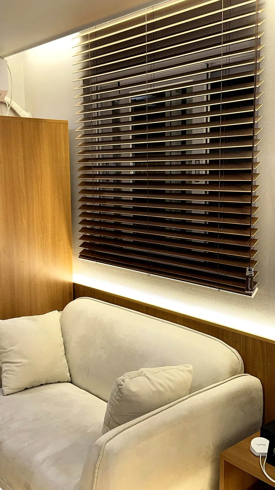 Interior of room 301 with soft lighting and the bed