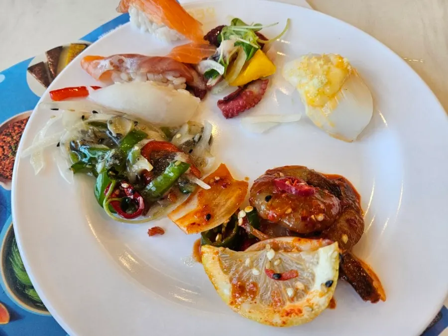Plate with fresh shrimp dishes