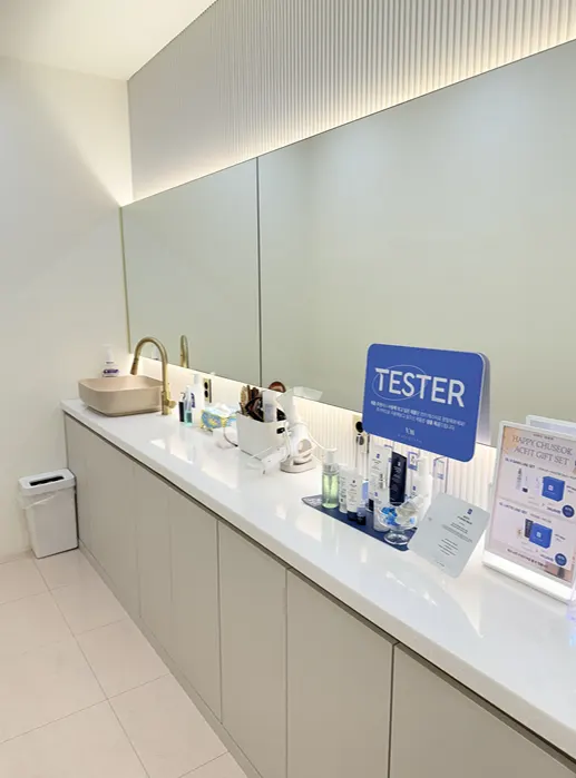 Mirror and grooming area in the powder room