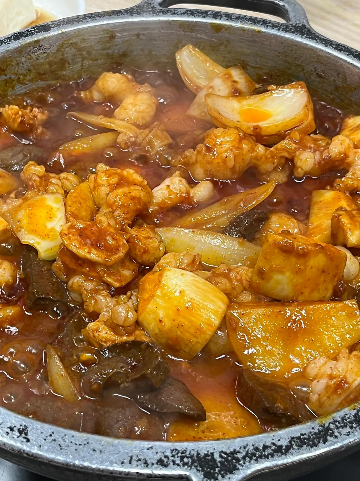 Stone-pan seasoned yang gopchang after staff prepped it